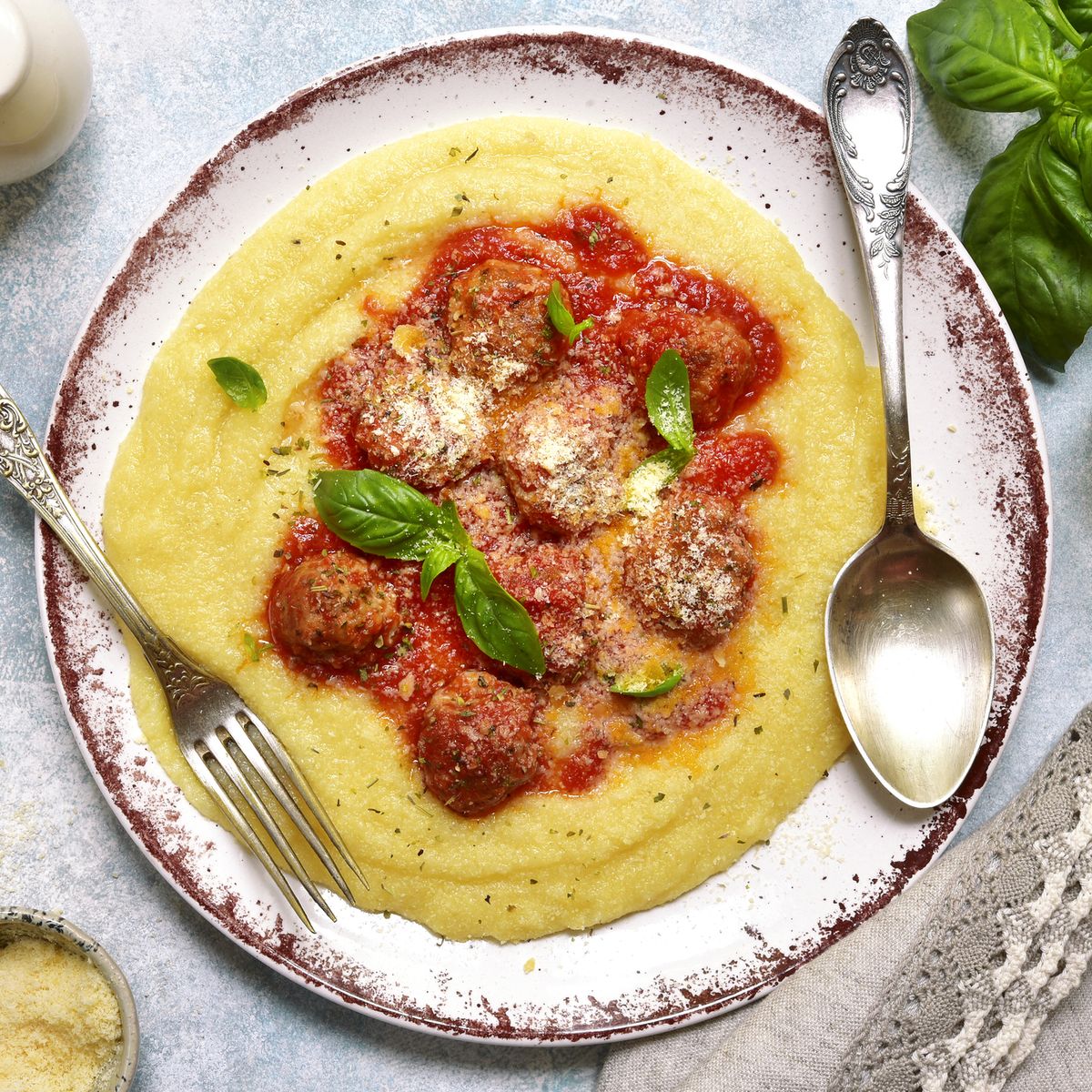 Polenta with meatballs in tomato sauce