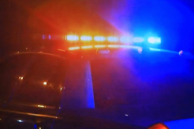 police car fast moving with bright flashing lights