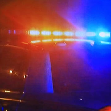 Police car - fast moving with bright flashing lights police car fast moving with bright flashing lights