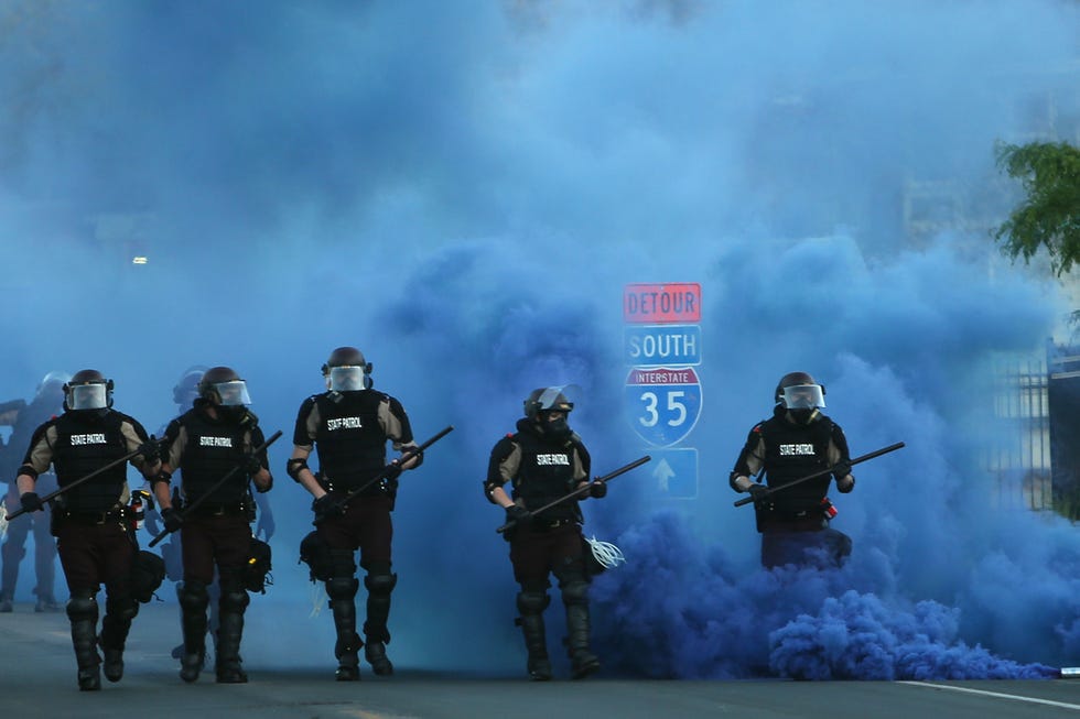 minneapolis, minnesota   may 30 police advance on demonstrators who are protesting the killing of george floyd on may 30, 2020 in minneapolis, minnesota former minneapolis police officer derek chauvin was arrested for floyd's death and is accused of kneeling on floyd's neck as he pleaded with him about not being able to breathe floyd was pronounced dead a short while later chauvin and three other officers, who were involved in the arrest, were fired from the police department after a video of the arrest was circulated  photo by scott olsongetty images