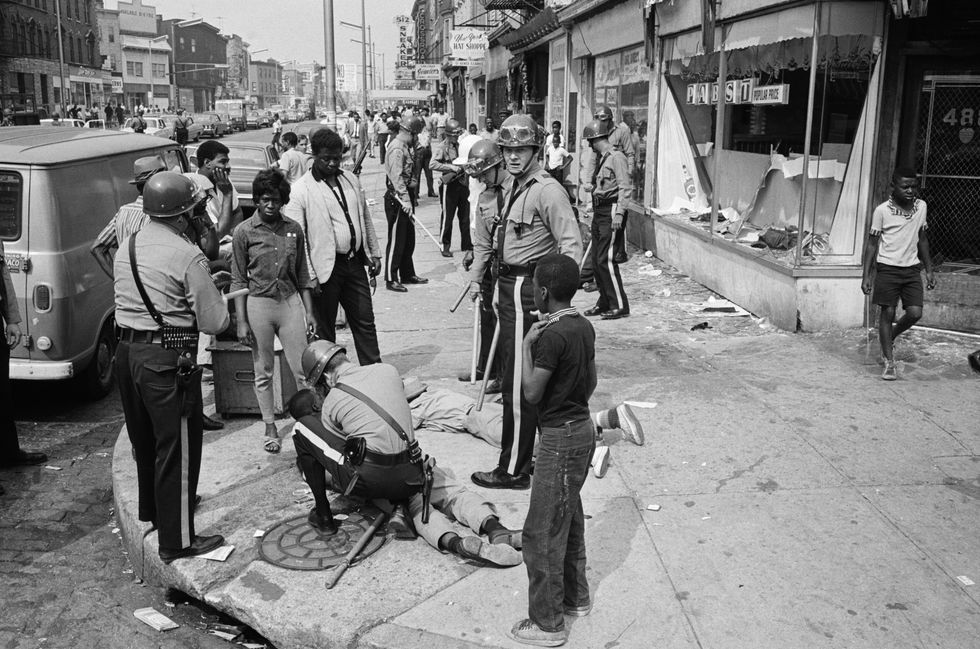 police arresting looters during 1967 newark riots