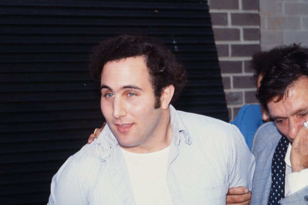 police officers escort serial killer david berkowitz