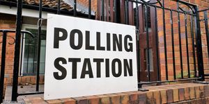 uk polling station sign outside church premises