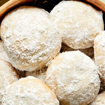 polvorones mexican wedding cookies covered in powdered sugar