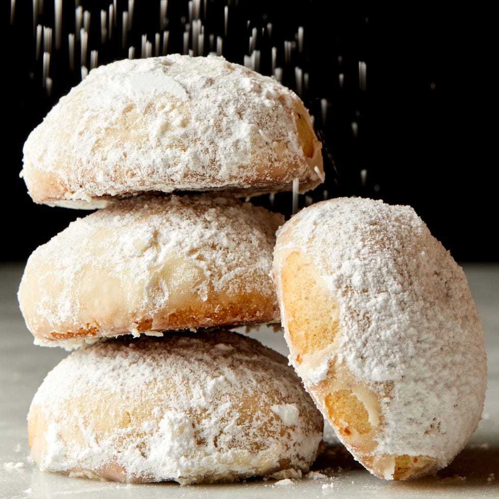 polvorones mexican wedding cookies covered in powdered sugar