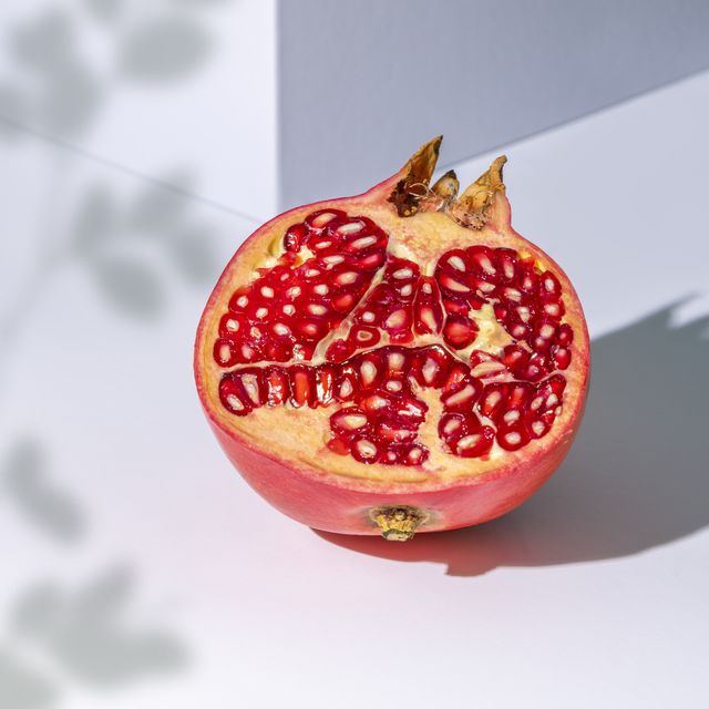 pomegranate slice on white background