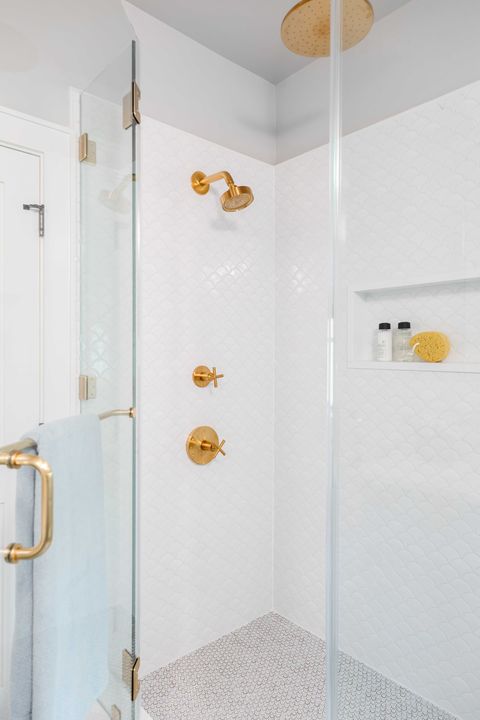 shower, white scallop tiles, guest bathroom, gold faucets and hardware