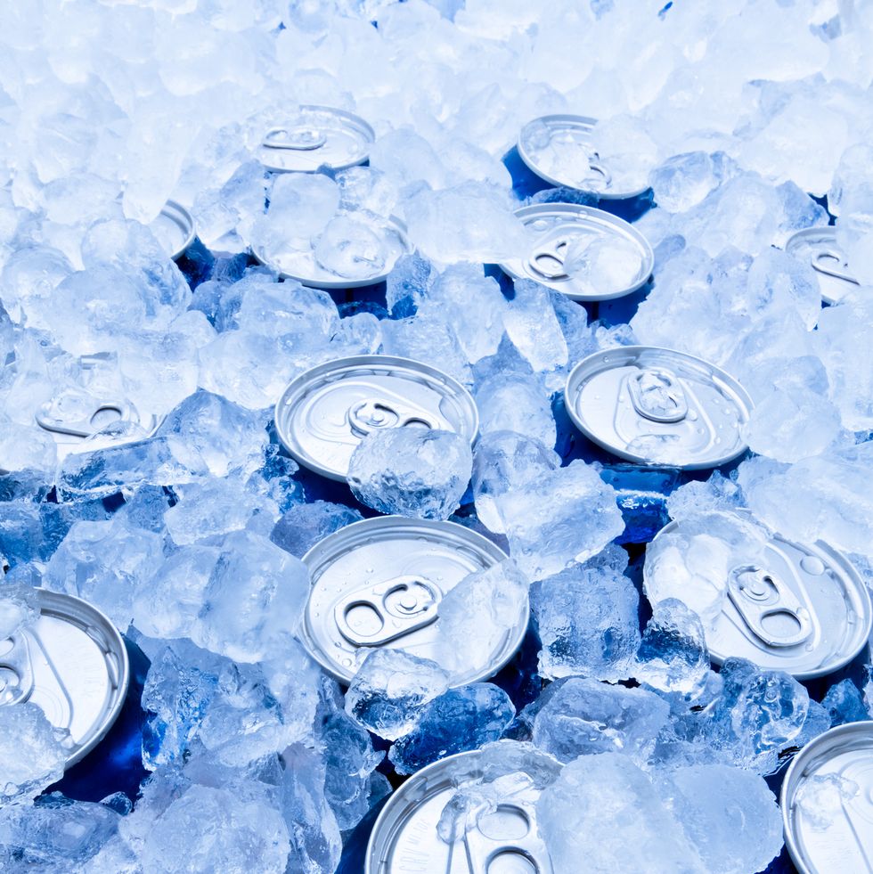soda or beer cans on ice