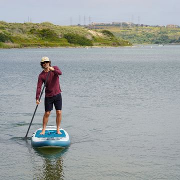 a man on a paddle board