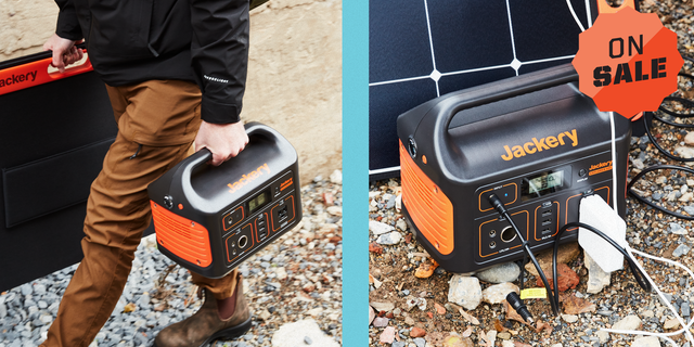 Jackery solar generator being set up outside and plugged into