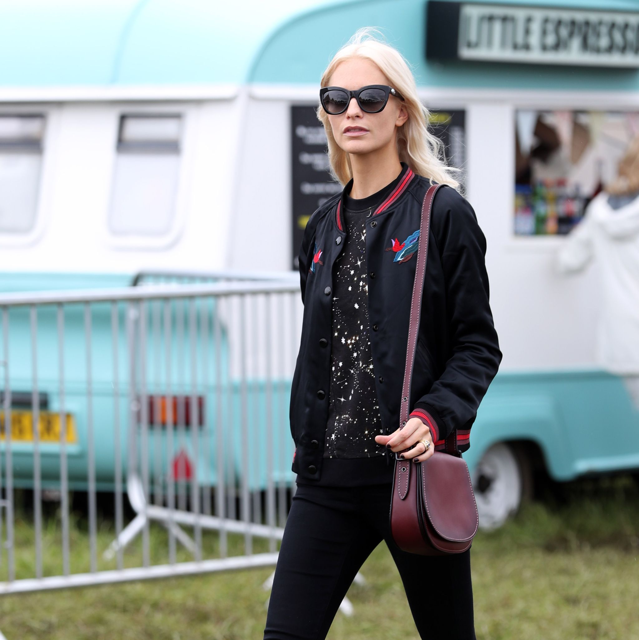 Poppy Delevingne makes a bold style statement in plunging black