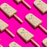 homemade popsicles on pink background