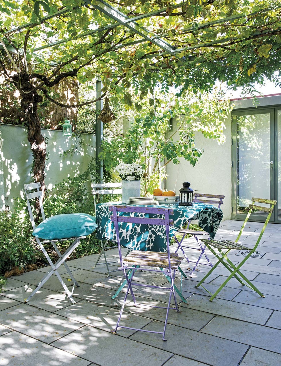 Porches y jardines: Comedor a la sombra