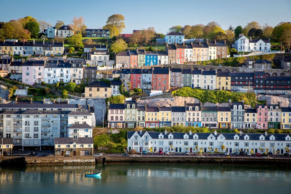 Colorful homes line the harbor in Cobh County Cork the final port of call for the RMS Titanic