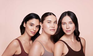 a group of women posing for a photo