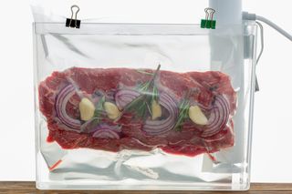 Portion of flat iron beef steak sous-vide cooking
