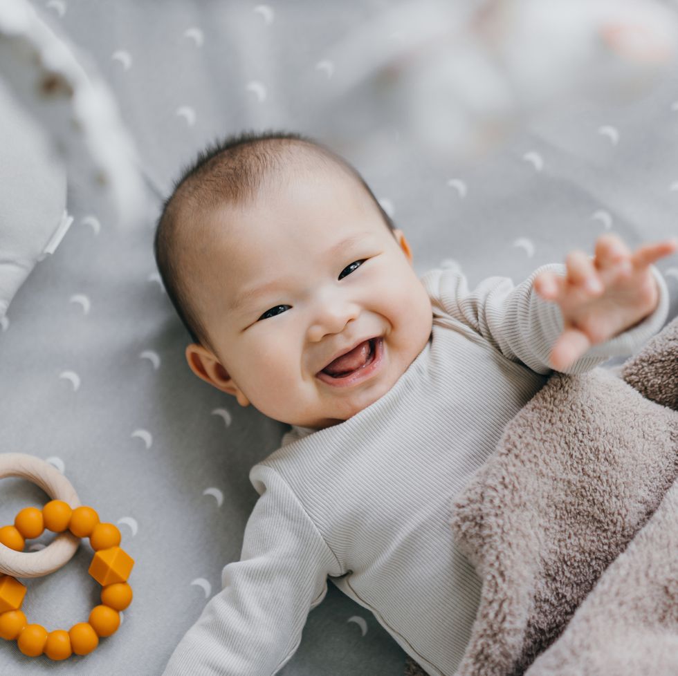 portrait of a lovely asian baby girl smiling
