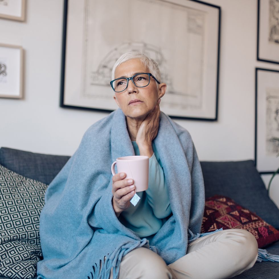 portrait of a senior woman having a flu
