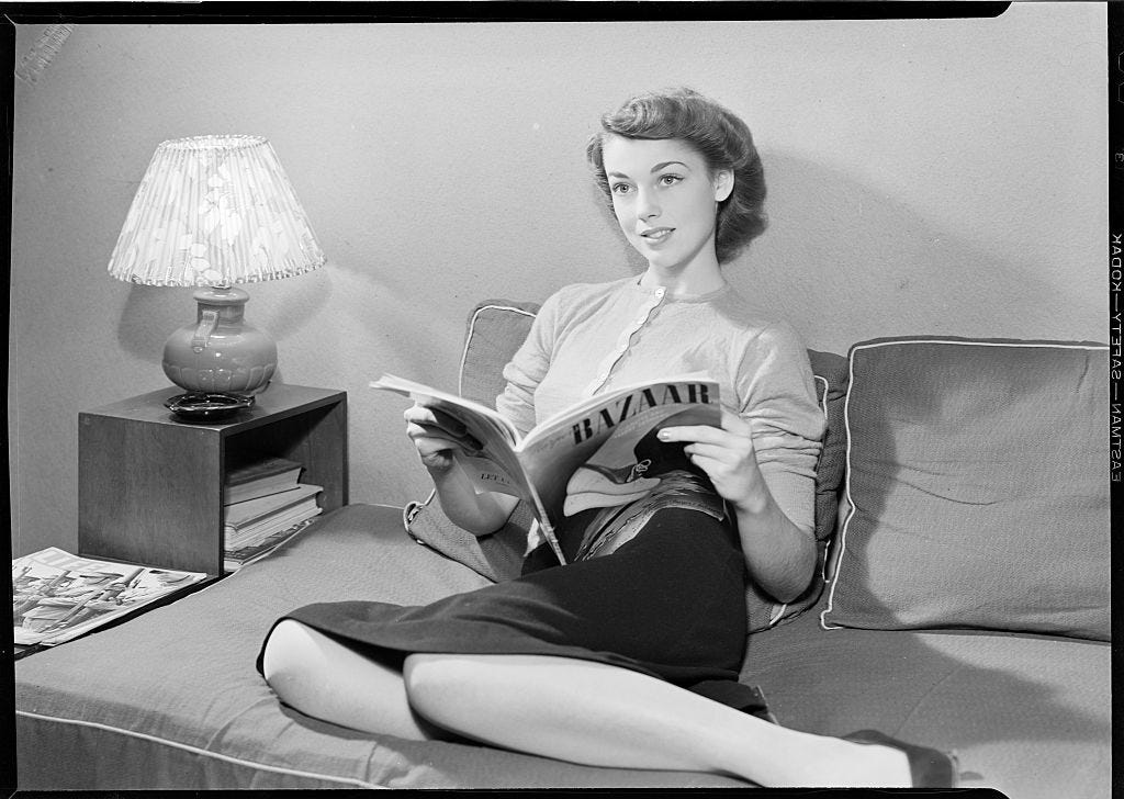 woman reading magazine