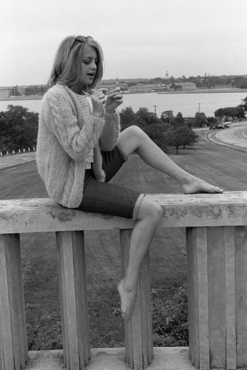 Goldie Hawn Sits On A Bridge