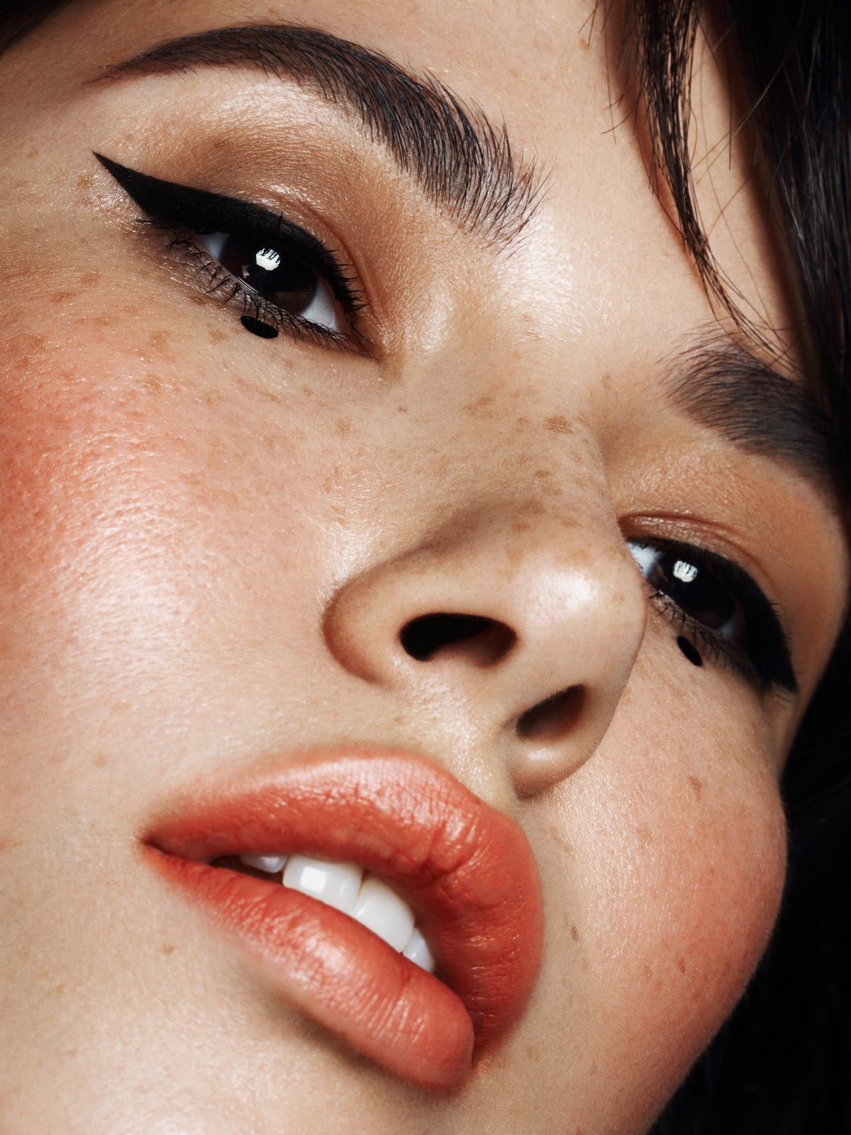 portrait of beautiful woman with cat eye makeup