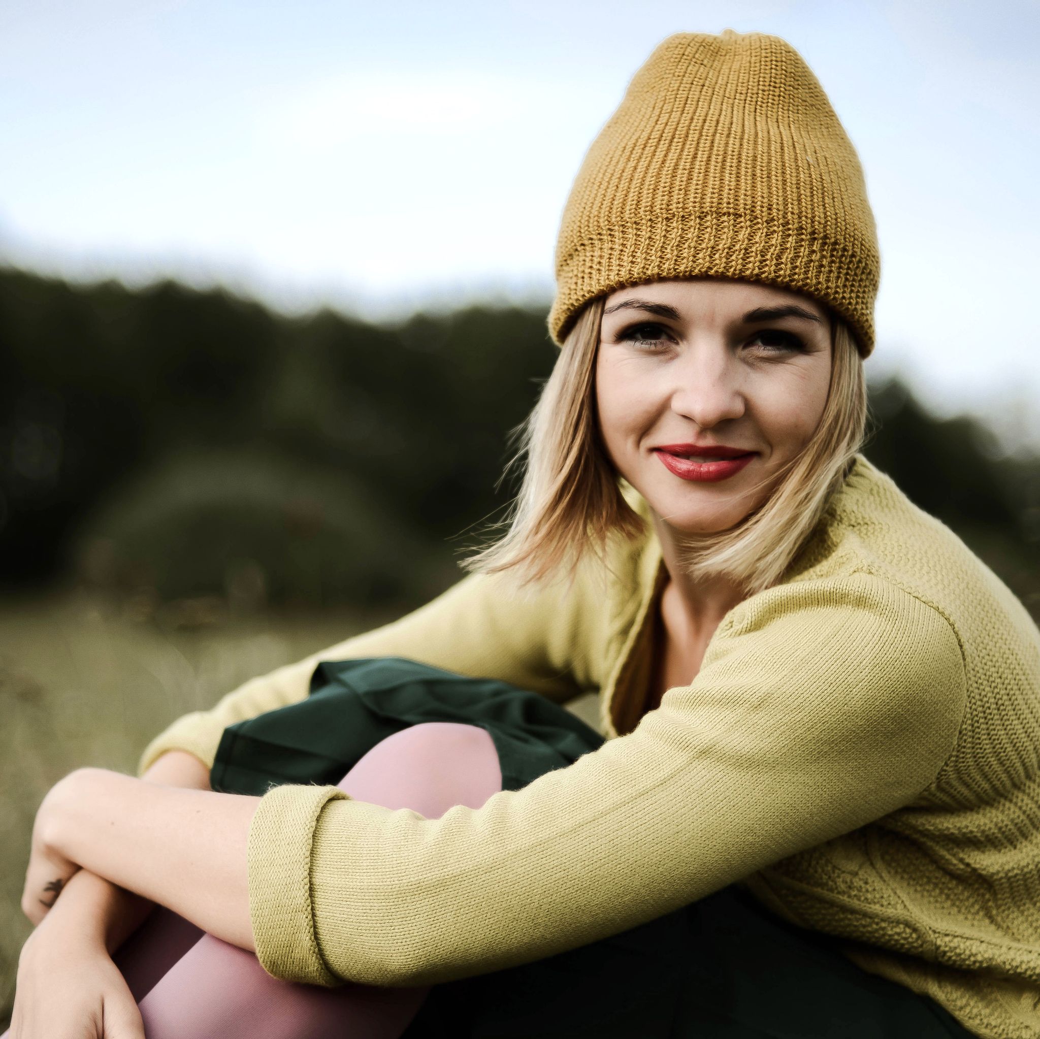 portrait of beautiful young woman in the autumn nature