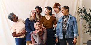 portrait of cheerful mixed age range multi ethnic women celebrating international women's day