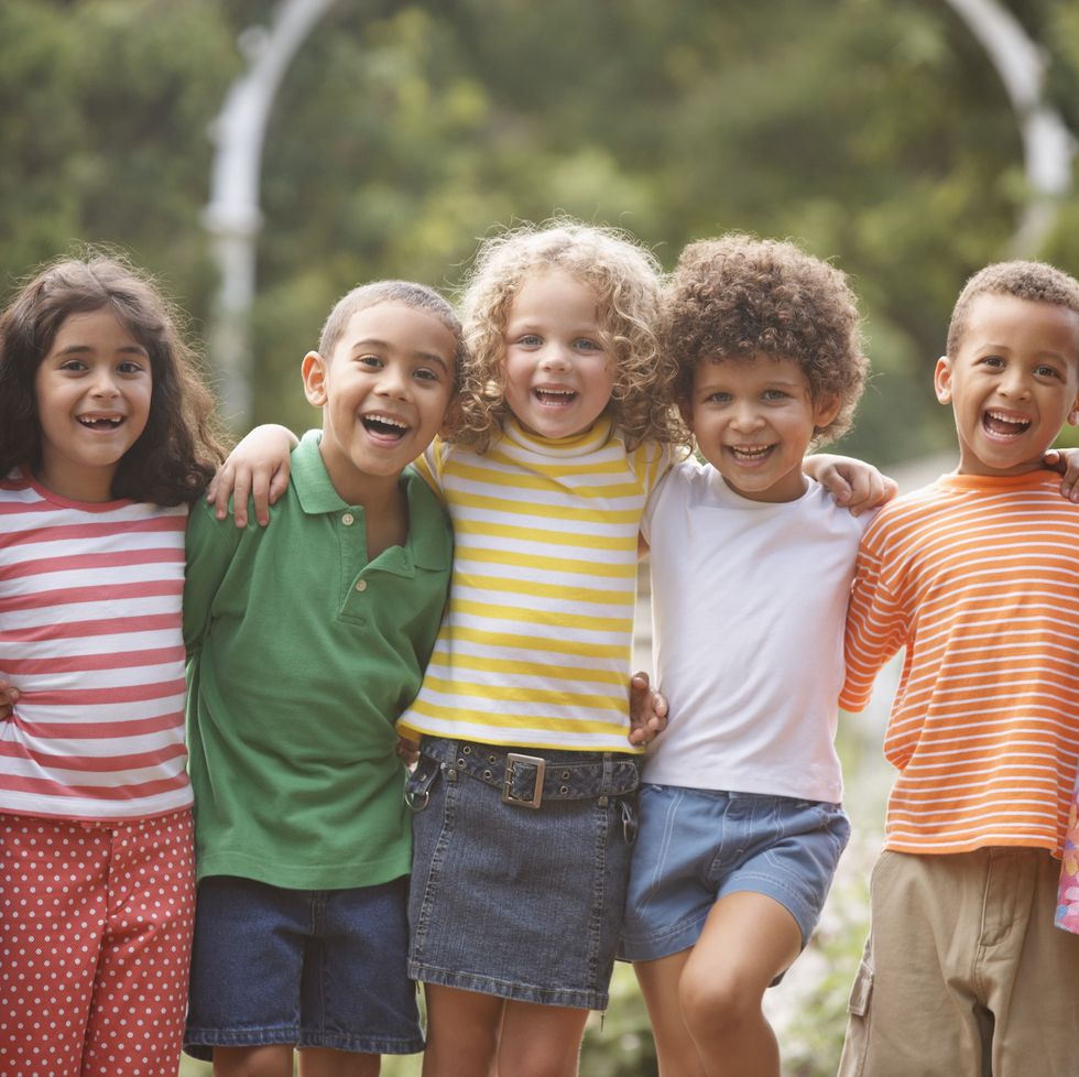 portrait of children arm in arm