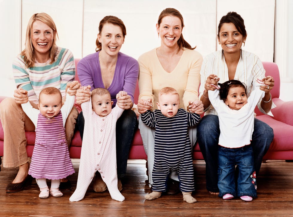 Portrait of Four Young Mothers with Their Babies