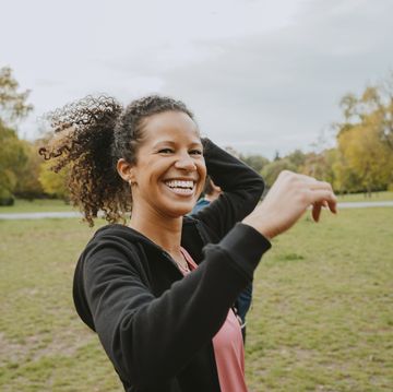portrait of happy woman in park