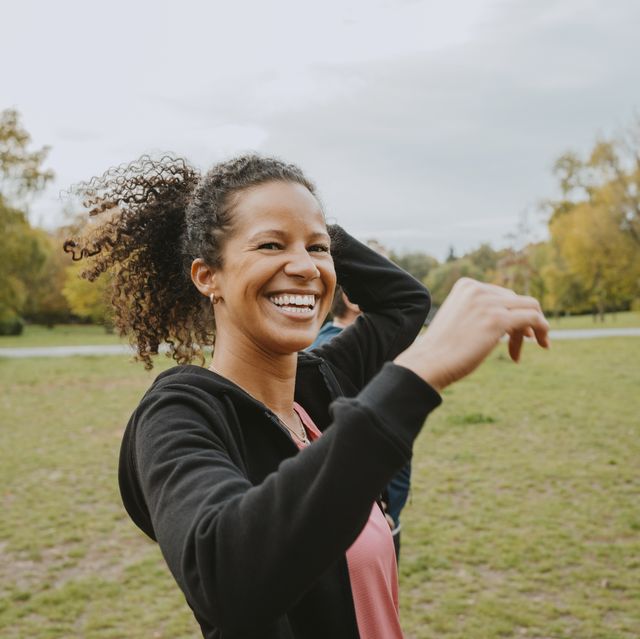 portrait of happy woman in park