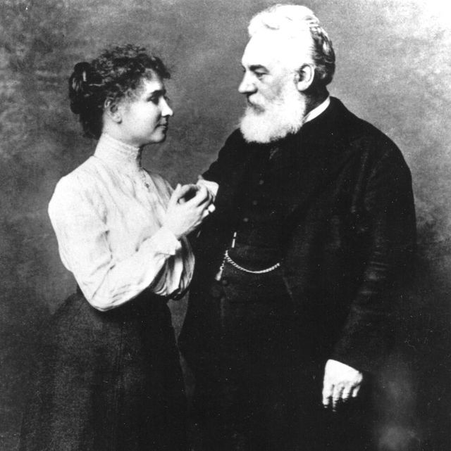 helen keller and alexander graham bell face each other while standing for a portrait