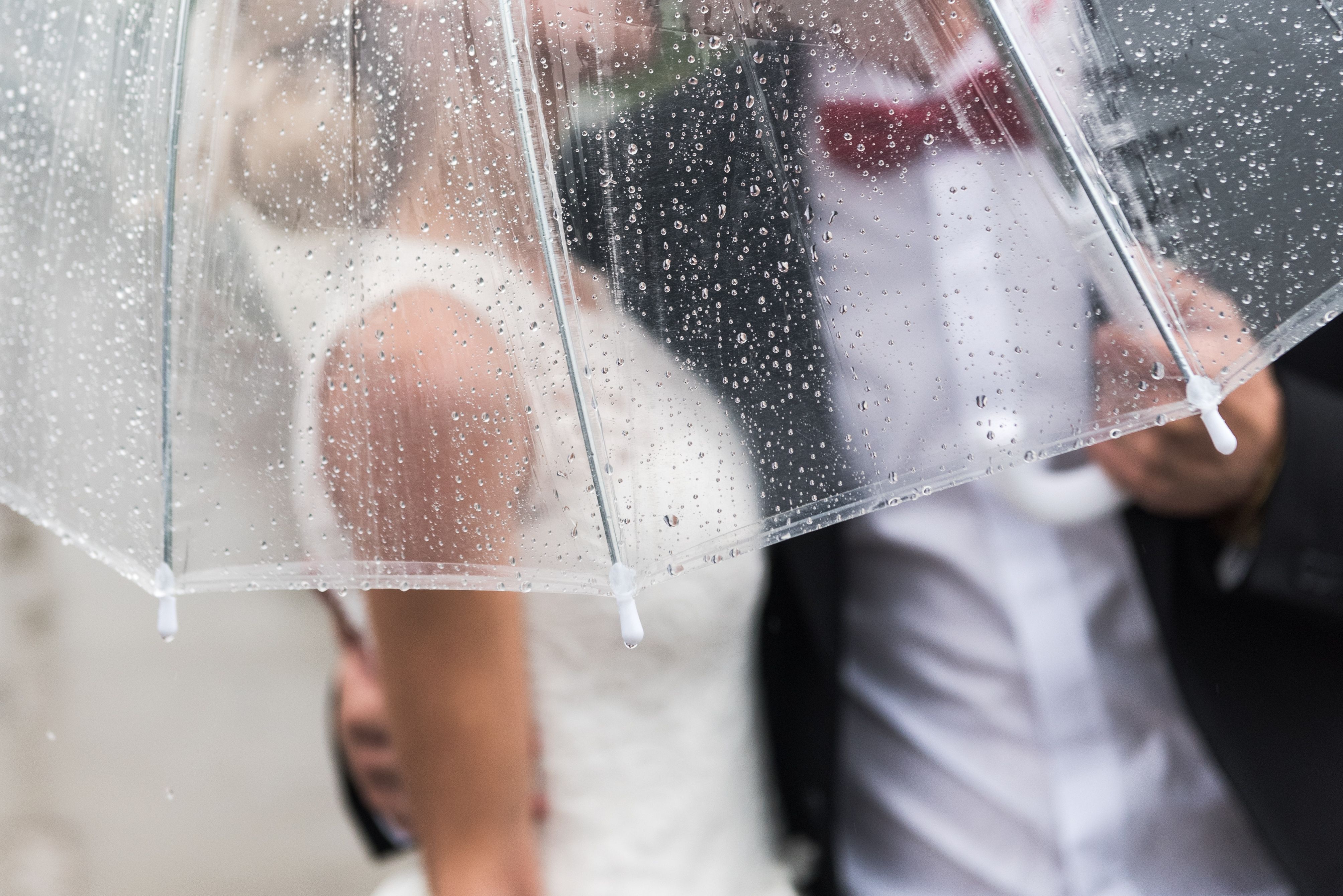 What To Do If It Rains On Your Wedding Day, Per Wedding Planners