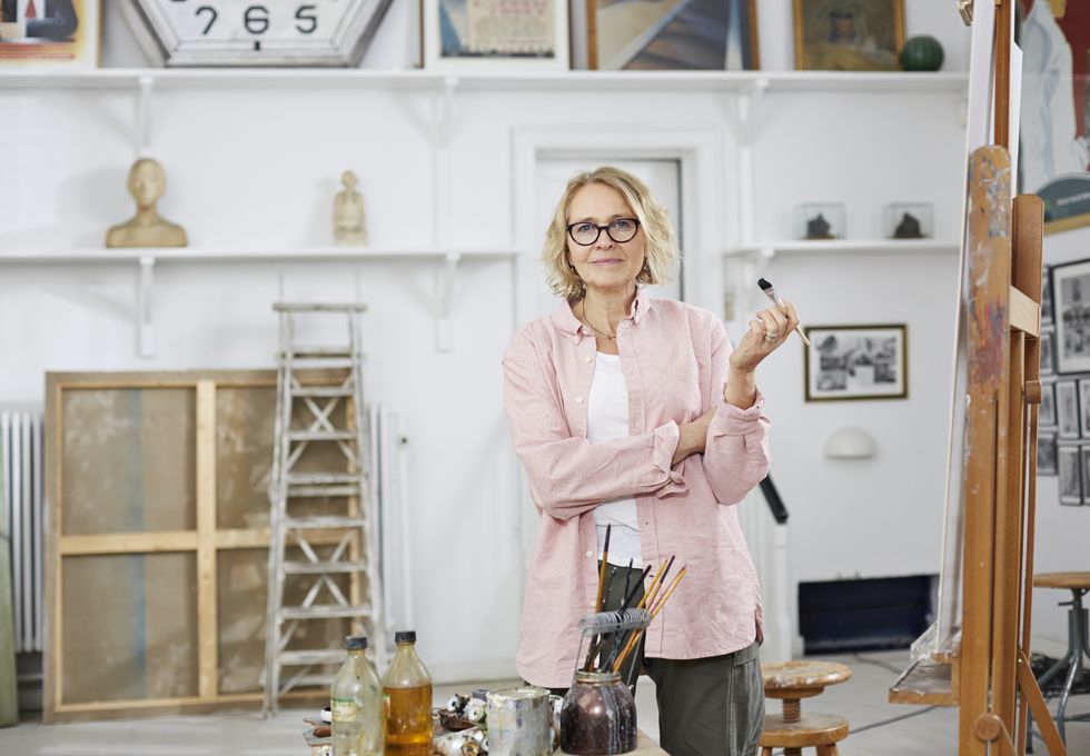 portrait of mature woman at her home studio