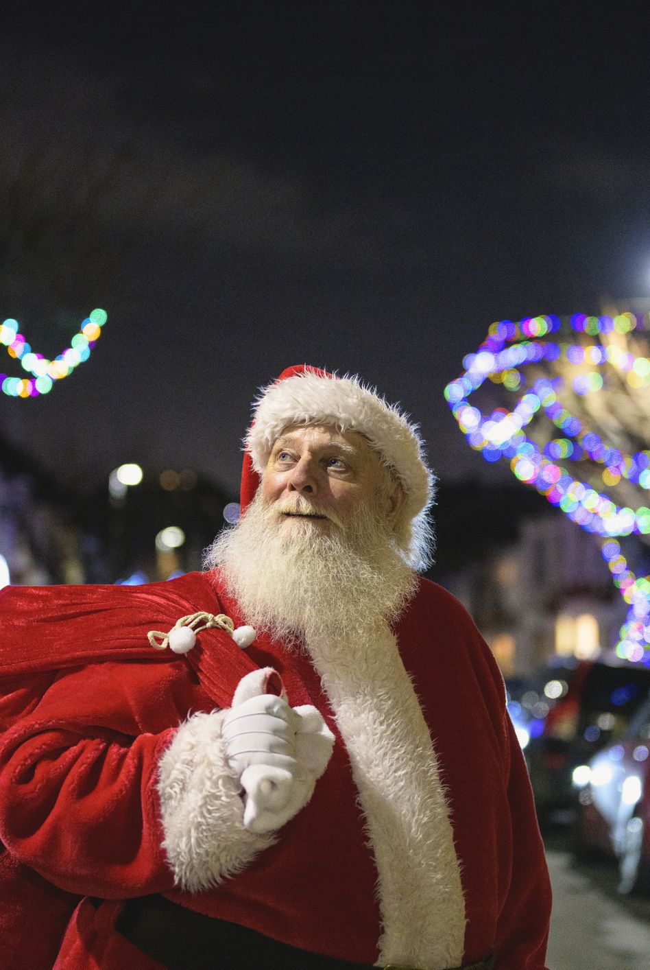 portrait of santa claus delivering gifts on christmas eve