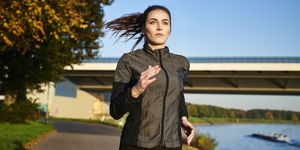 Portrait of sportive woman jogging