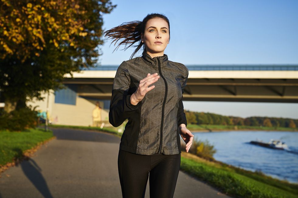 portrait of sportive woman jogging