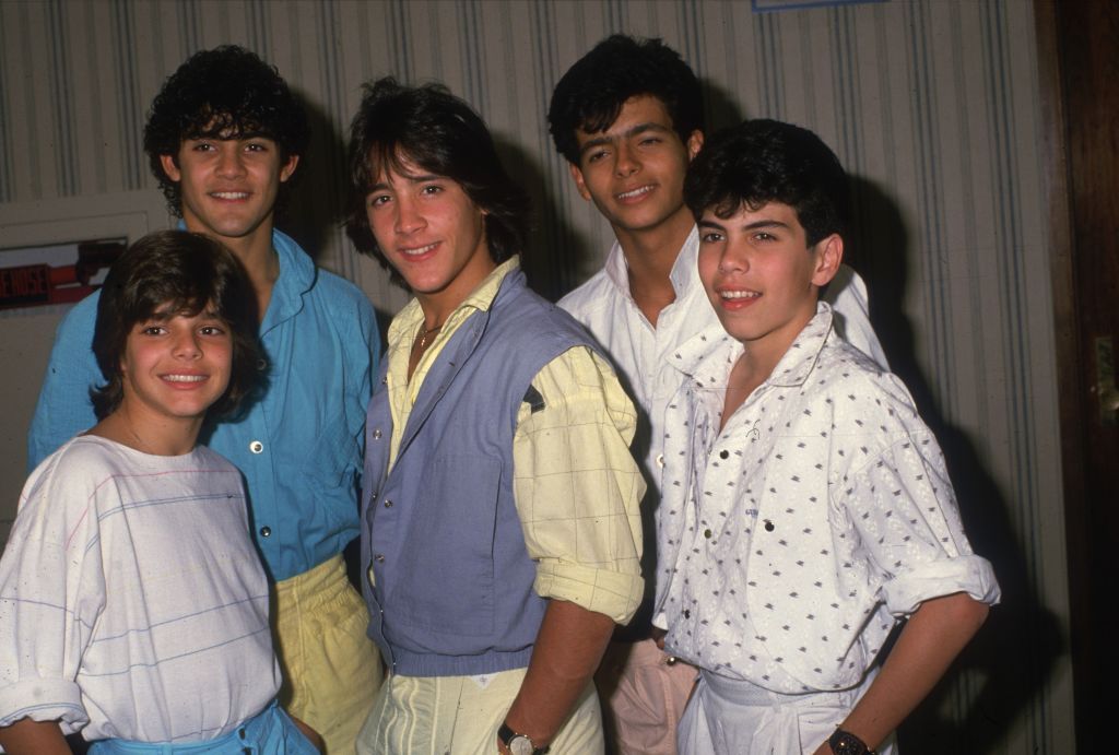 Portrait Of Teen Pop Group Menudo Posing In A Hallway At News Photo 1656009508 