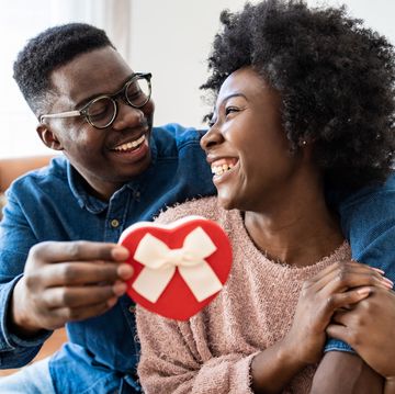 https://hips.hearstapps.com/hmg-prod/images/portrait-of-young-couple-celebrating-valentines-day-royalty-free-image-1703433460.jpg?crop=0.668xw:1.00xh;0.167xw,0&resize=360:*