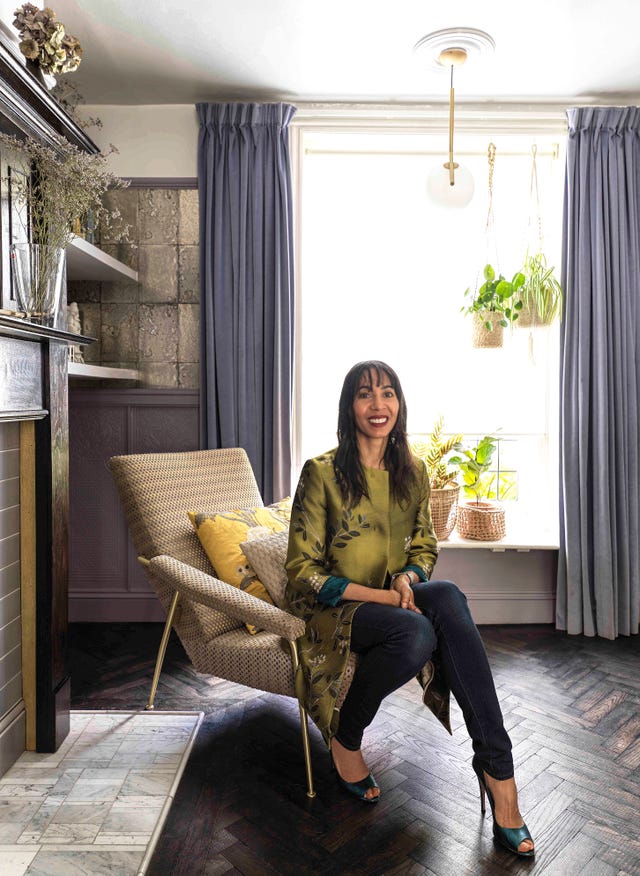 michelle sits on her ‘d1531’ chair by gio ponti for molteni  c, upholstered in rubelli’s ‘puntegiato’ fabric, also designed by ponti