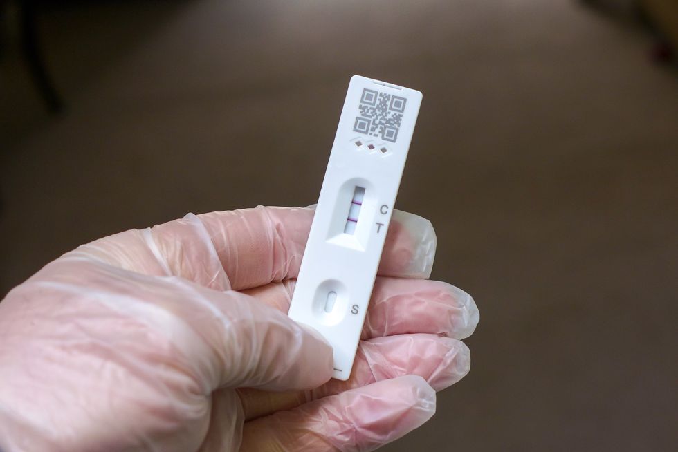 positive cassette rapid test for covid19, test result by using rapid test device for covid19 novel coronavirus