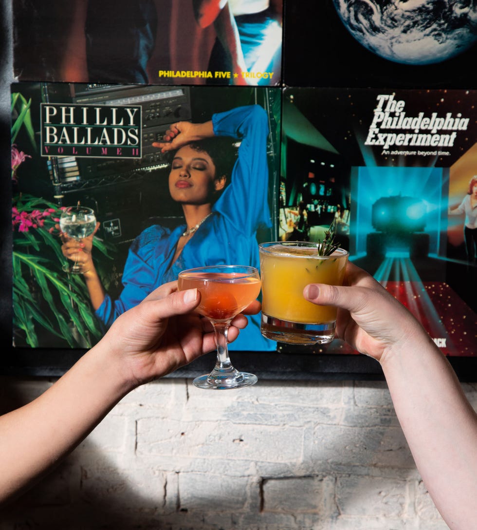 a person holding a drink