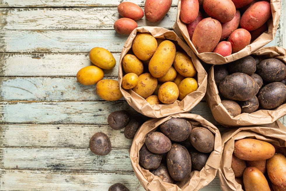 bags of different colored potatoes