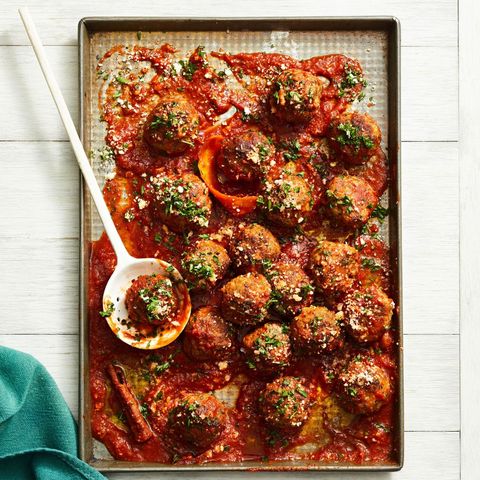 saucy sausage meatballs on a sheet tray