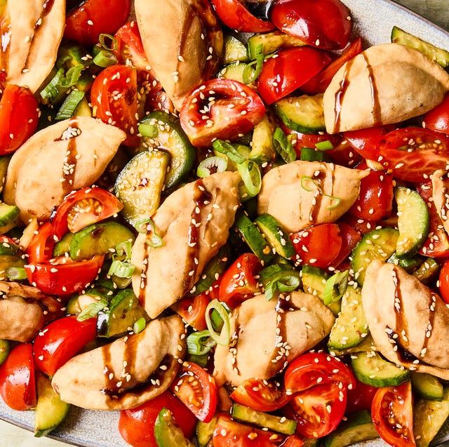 Potsticker Panzanella deep fried dumplings tossed with soy and chili marinated tomatoes and cucumbers