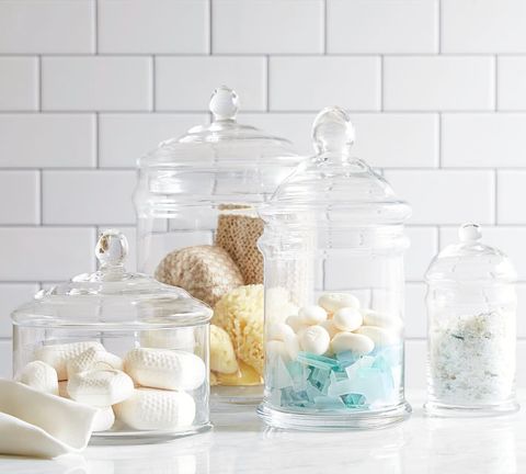 glass jars with soaps in them