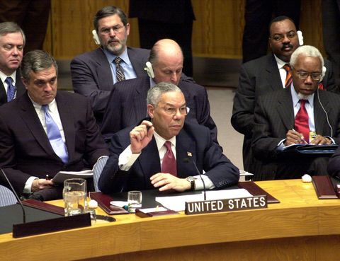 united states   february 05  secretary of state colin powell addresses the united nations security council wielding dramatic satellite photos and intelligence intercepts, he cited "irrefutable and undeniable" evidence that iraq still conceals massive quantities of terror weapons seated in the row behind powell, is cia director george tenet left  photo by thomas monasterny daily news archive via getty images