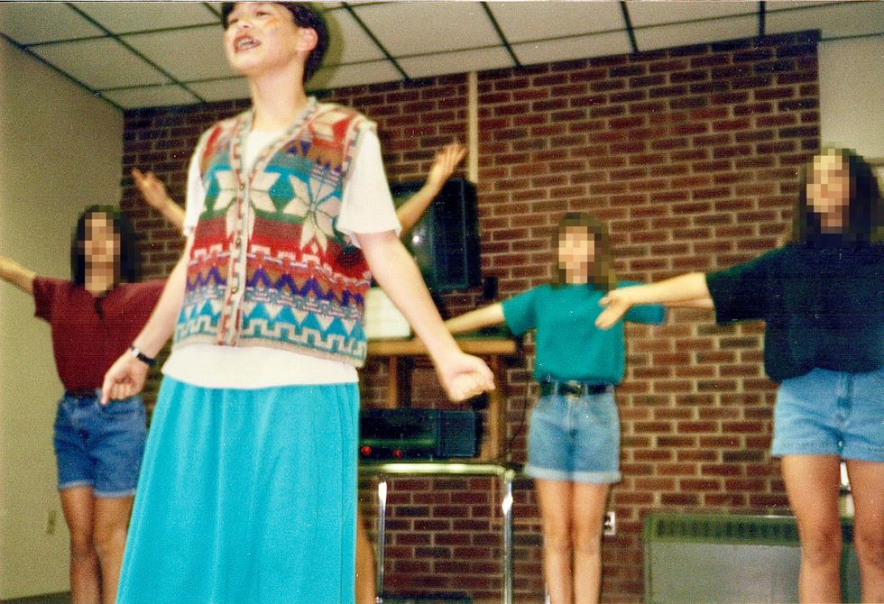 the author performing at summer camp at age 11 or 12