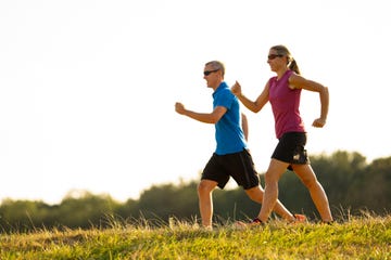 power walking couple outdoors in summer