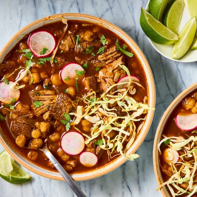 pozole with pork shoulder topped with cabbage and radishes